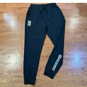 Under Armour Women’s Black Jogger Sweatpants Motu/Maha Graphic Size L